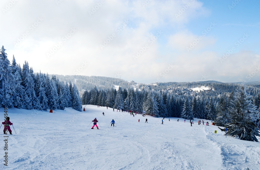 skiers on the trail on the mountain skiers on the trail on the mountain