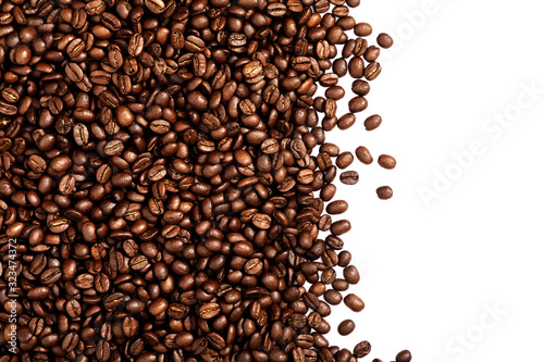 Coffee beans isolated on white background with space for text. Roasted coffee beans as background. Flat lay, top view, copy space