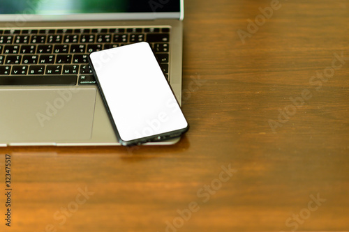 Laptop smartphone and tablet mockup with blank screen on table, Concept mockup.