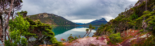 Panoramic view over magical austral forest and turquoise lagoons in Tierra del Fuego National Park, Beagle Channel, Patagonia, Argentina, early Autumn photo