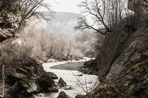 Spring mountain river flow background