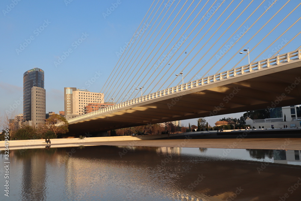 Long Bridge reflex in the water at evening in Valencia