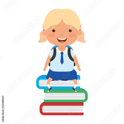 cute little student blond girl seated in books