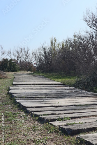 Wood Path in the park Saler Beach in Valencia