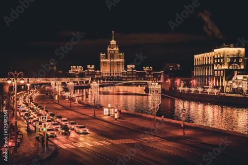 Wide angle view traffic in the city of Moscow at night. Travel destination Moscow, Russia