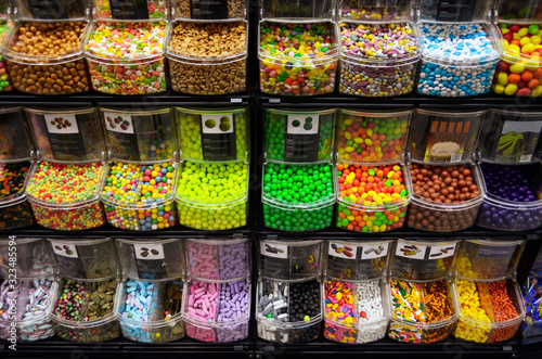 boxes with colorful candies in a candy shop © Michael Barkmann