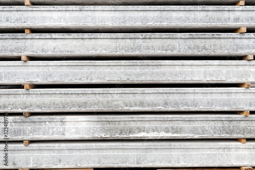 Background texture of stack of Prefabricated concrete slabs for construction.