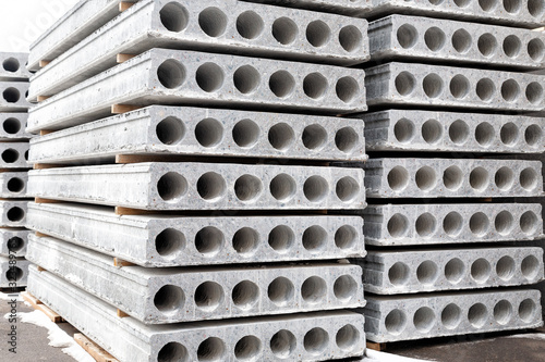 Konstfotografi Stack of Prefabricated concrete slabs with hole for construction.