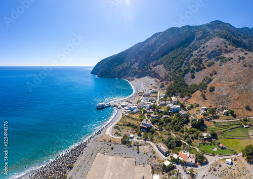 Obraz na płótnie Aerial panoramic shot of Agia Roumeli beach in Chania of Crete, Greece. The village of Agia Roumeli is located at the entrance of the gorge Samaria w salonie