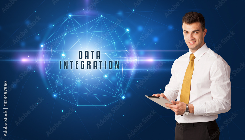 Businessman thinking about security solutions with DATA INTEGRATION inscription Businessman thinking about security solutions with DATA INTEGRATION inscription