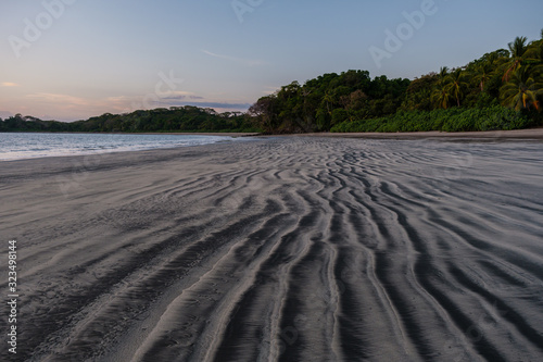 Beautiful remote beach in Panama with line pattern in the sand