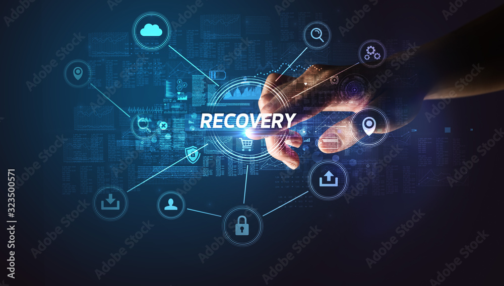 Hand touching RECOVERY inscription, Cybersecurity concept Hand touching RECOVERY inscription, Cybersecurity concept