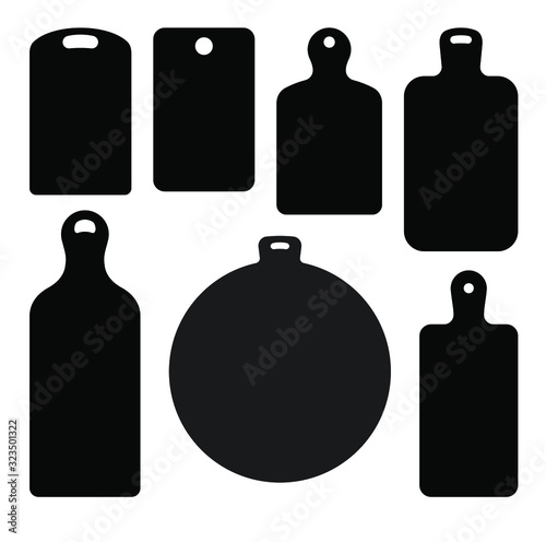 Set of seven black vector cutting boards silhouettes.