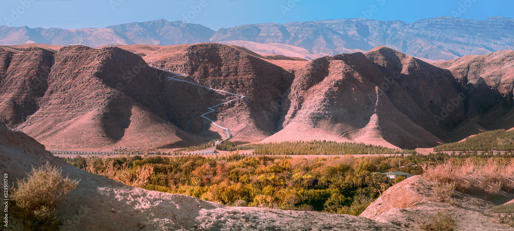Panoramic view to the 37 kilometers long  Serdar Health Path in valley within the Kopet Dag Mountains in background.  Turkmenistan