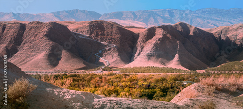 Billede på lærred Panoramic view to the 37 kilometers long  Serdar Health Path in valley within the Kopet Dag Mountains in background