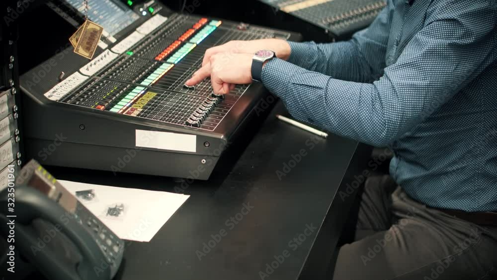 Sound Engineer Moving Sliders In Radio Station.Sound Designer Used