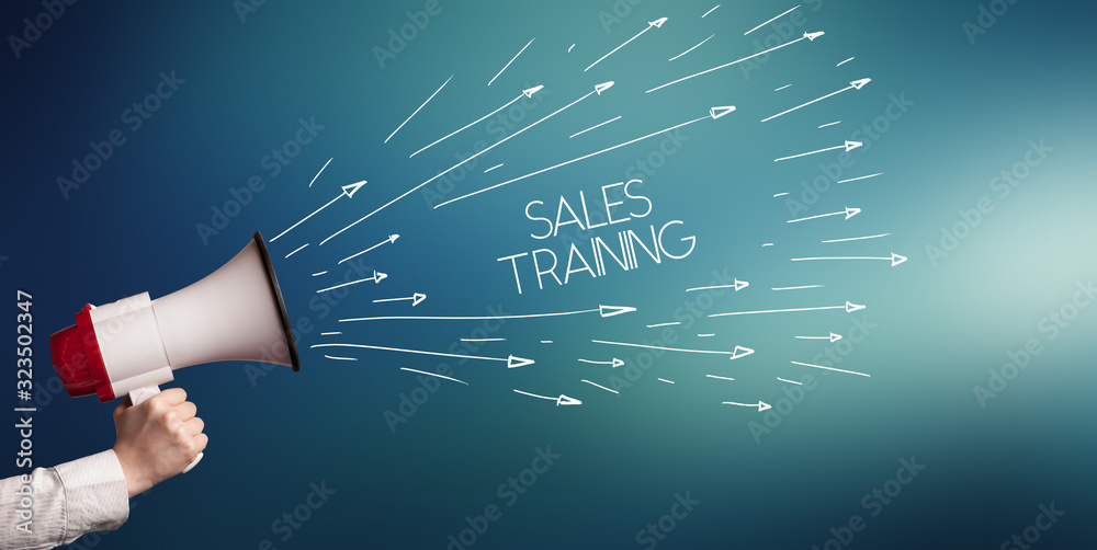 Young girl screaming to megaphone with SALES TRAINING inscription, shopping concept Young girl screaming to megaphone with SALES TRAINING inscription, shopping concept