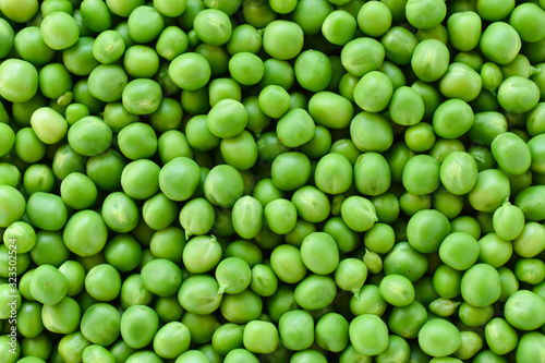 Green pea. Background for postcards. Green background and peas.