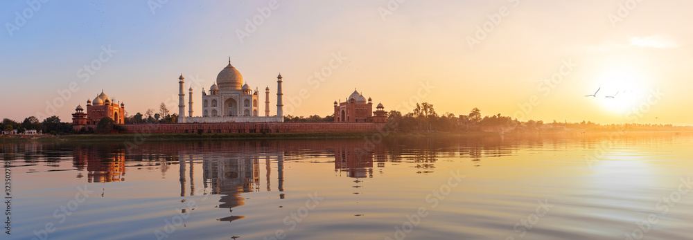 Taj Mahal sunset panorama, view from the Yamuna river, Agra, India