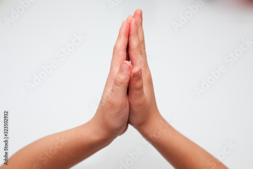 praying hands on white background