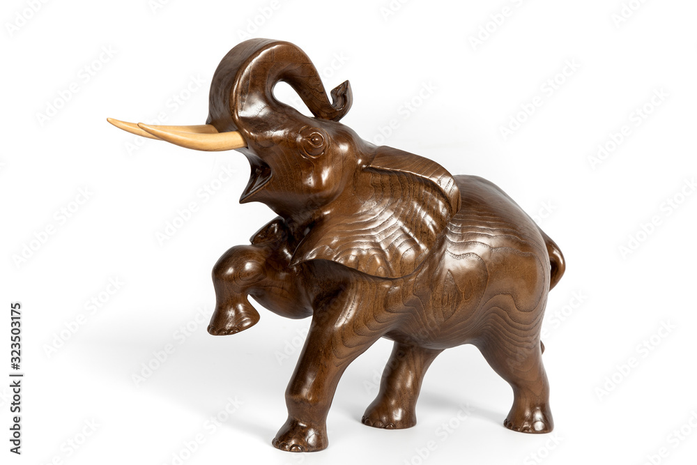 wooden figure of a elephant isolated on background.