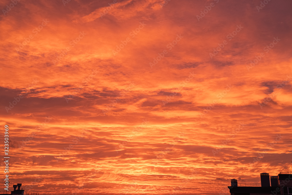 Landscape with a beautiful, cloudy sky in the colors of dawn Landscape with a beautiful, cloudy sky in the colors of dawn