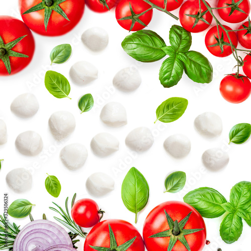 Food  Pattern with vegetables, cheese,  basil leaf, rosemary and tomatoes  isolated  on white background.Creative layout. Flat lay. Top view