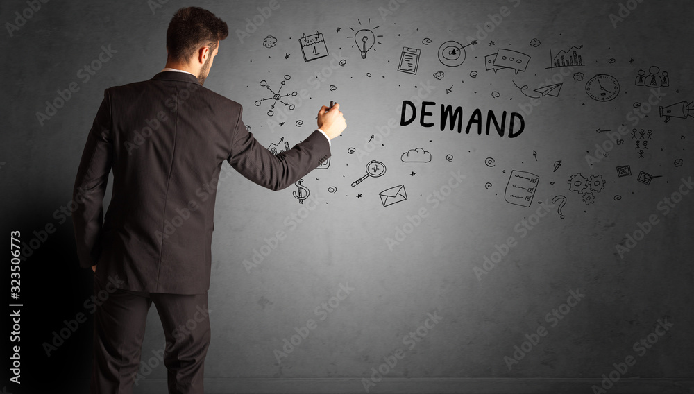 businessman drawing a creative idea sketch with DEMAND inscription, business strategy concept businessman drawing a creative idea sketch with DEMAND inscription, business strategy concept