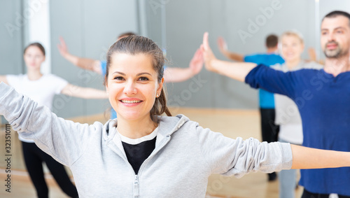 Woman training at group dance class