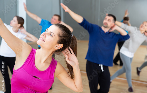 Young woman enjoying active dances