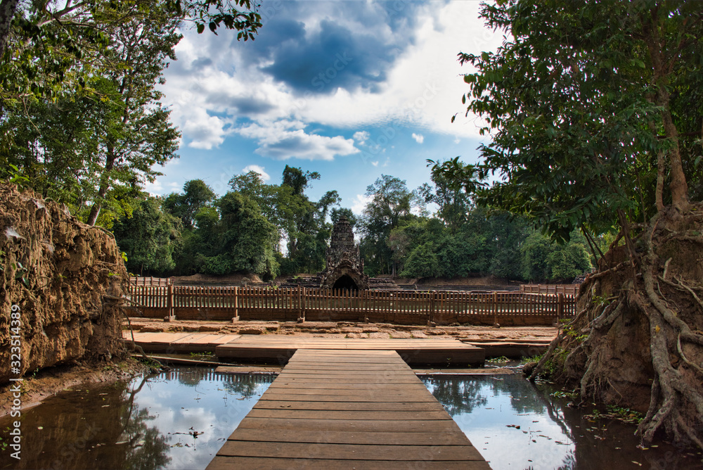 Neak Poan is an artificial island with a Buddhist temple on a circular island in Cambodia Neak Poan is an artificial island with a Buddhist temple on a circular island in Cambodia