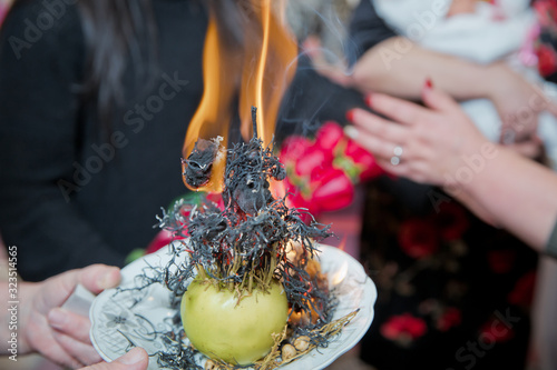 Incense of herb smokes for good luck. Magic plant uzerlik . Burning prevents bad looking . Peganum harmala. photo