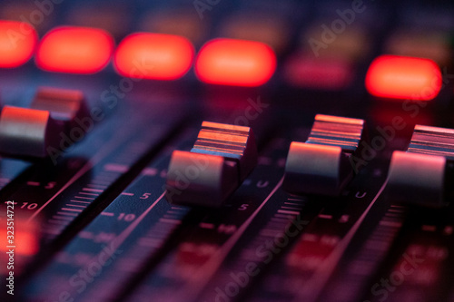 Obraz na plátne Volume control of the soundboard in red light