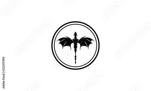 Vector black logo on which an abstract image of a flying dragon in the center of the circle.