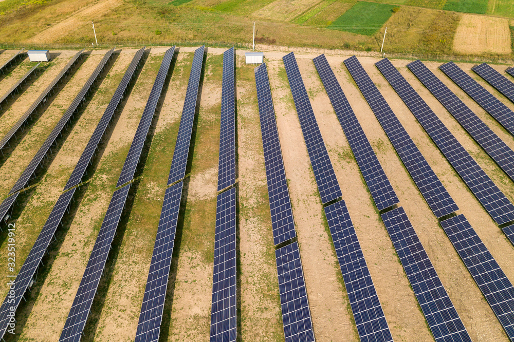 Aerial view of solar power plant. Electric panels for producing clean ecologic energy. Aerial view of solar power plant. Electric panels for producing clean ecologic energy.