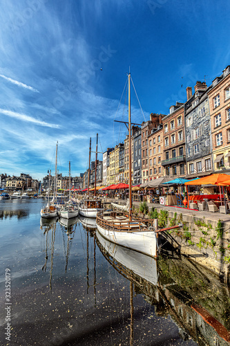 Ports don't come any prettier than Honfleur on the Seine's estuary. Glorious historic houses jostle for position on the quays, as do galleries and restaurants. photo