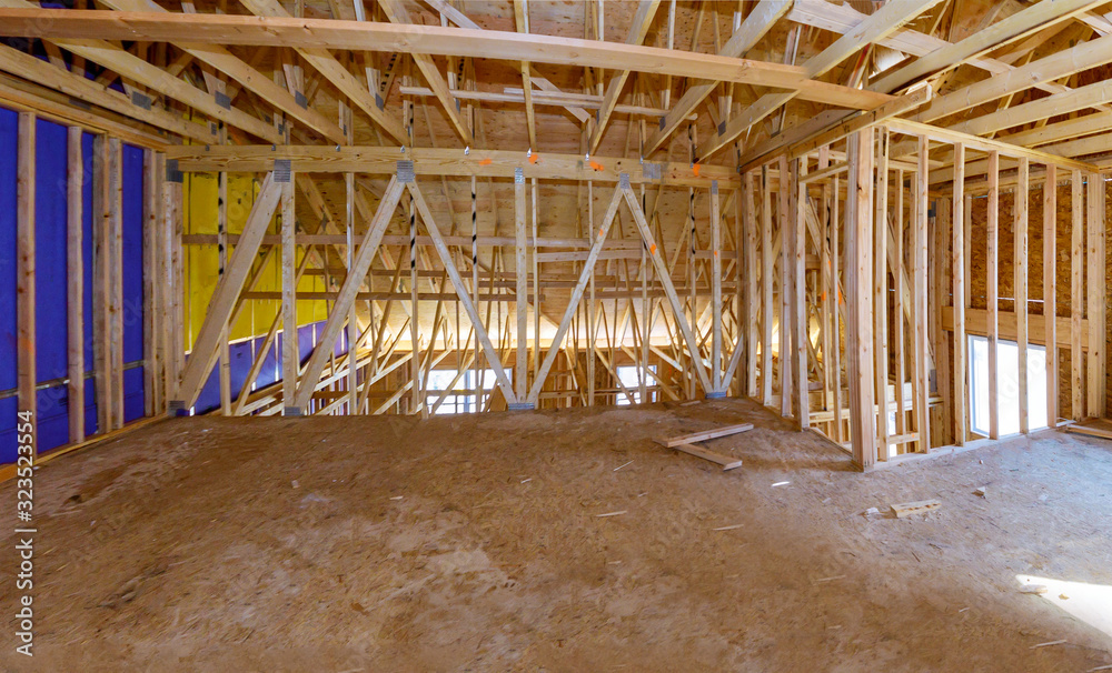 Framing beam of new house under construction interior of roof structure interior construction Framing beam of new house under construction interior of roof structure interior construction