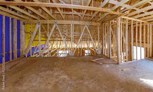 Framing beam of new house under construction interior of roof structure interior construction