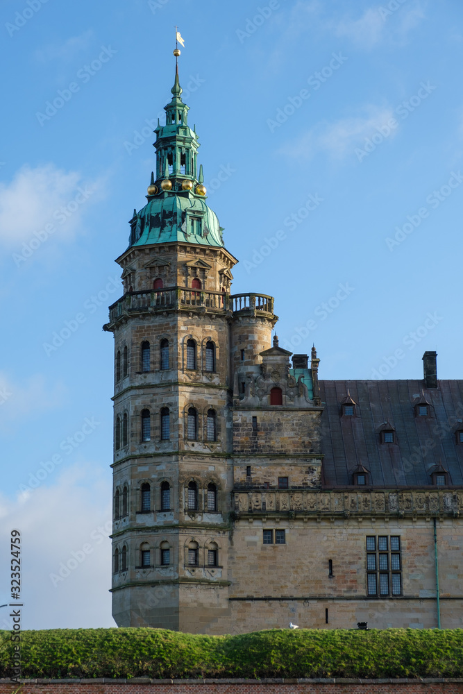 A Photograph of one of the towers at Kronborg Castle against a blue sky