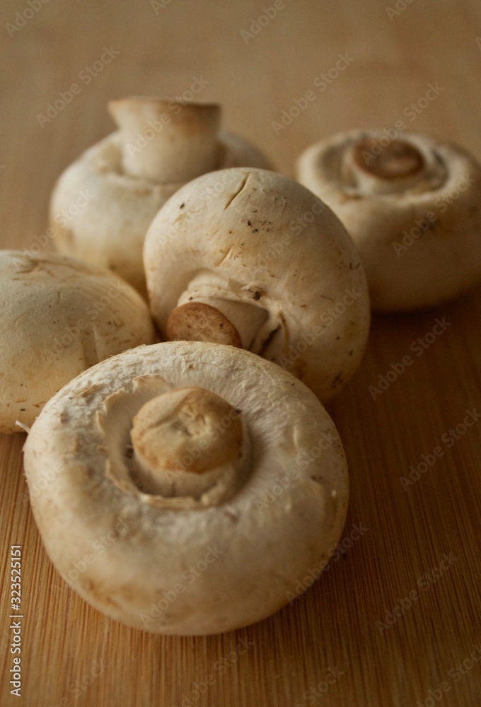 Mushrooms on a wooden cutting board