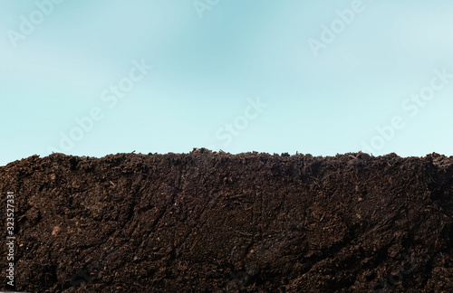 Soil or dirt section with sky