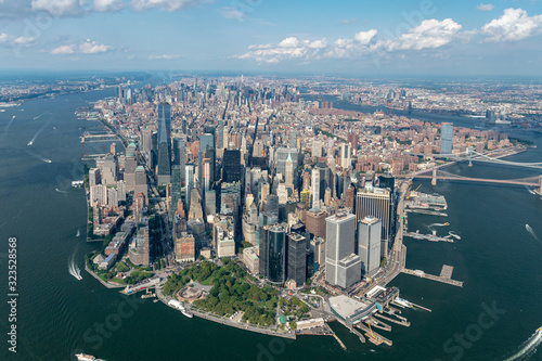 Aerial photograph One World Trade Center and Manhatten Island during a sunny day