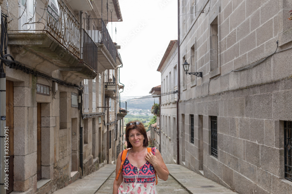 Portrait of a mature woman on a walk in Tui, Galicia, Spain
