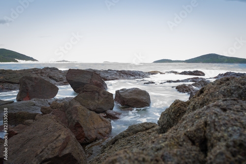 A photo of the rocks and waves at Nelson bay, New South Wales taken in the evening