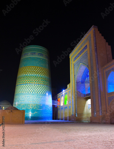 Kalta Minor Minaret (minaret Muhammad Amin Khan (19th century)) at night. Khiva, Uzbekistan photo