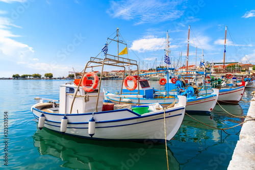 Typical colourful Greek fishing boats in Pythagorion port, Samos island, Greece