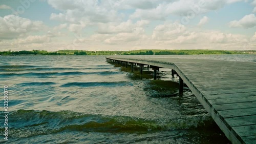 Wallpaper Mural breathtaking landscape with wooden pier on waving river Torontodigital.ca