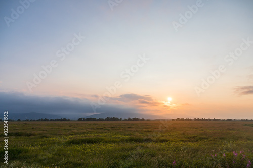Sunset in the field, Kamchatka Peninsula, Russia.