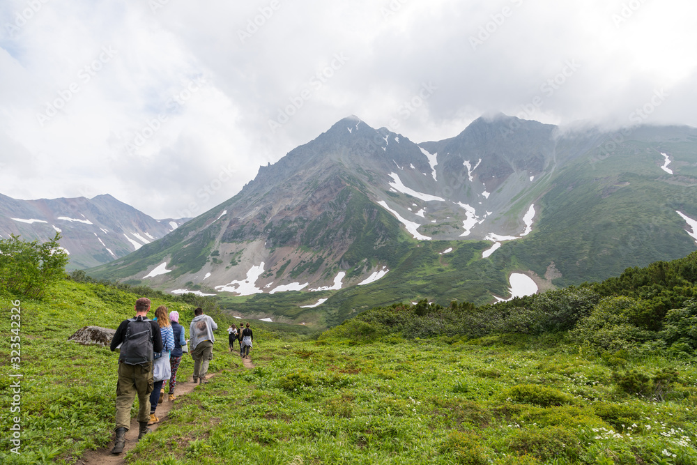 Vachkazhets mountain range, Kamchatka Peninsula, Russia. These are the remains of an ancient volcano, divided as a result of a strong eruption into several parts. Regional monument of nature. Vachkazhets mountain range, Kamchatka Peninsula, Russia. These are the remains of an ancient volcano, divided as a result of a strong eruption into several parts. Regional monument of nature.