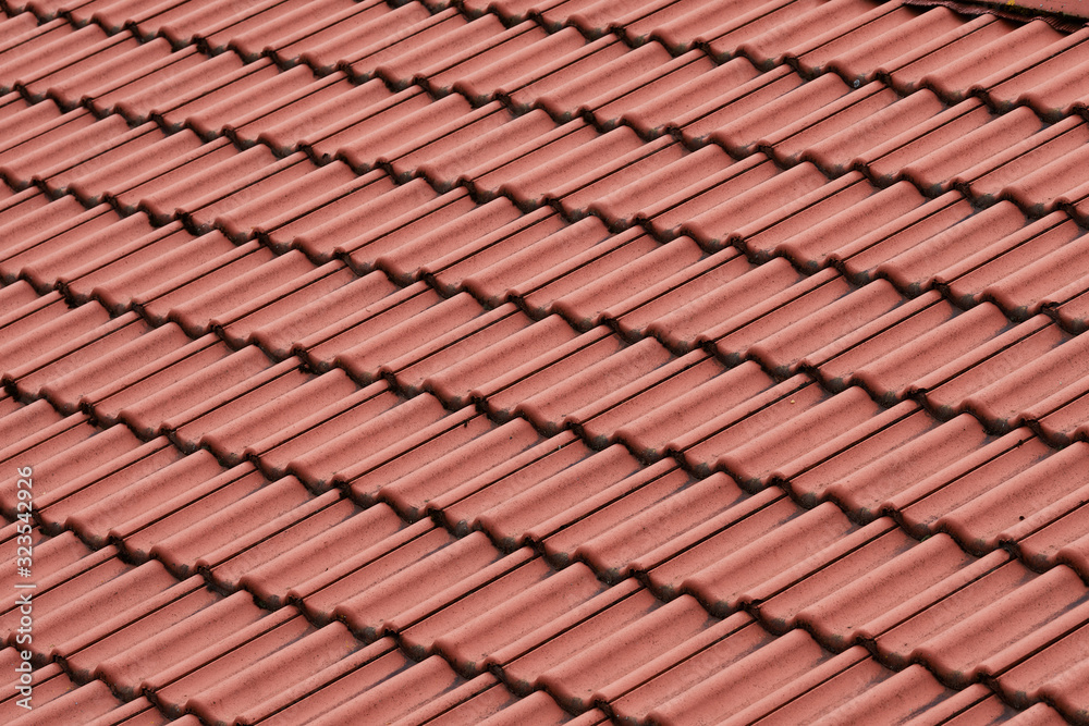 Details of the red tiles of a roof Details of the red tiles of a roof